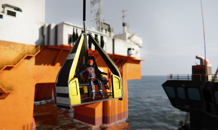 A worker in safety gear is seated in a yellow hoist basket, suspended over water, with an offshore oil platform in the background.